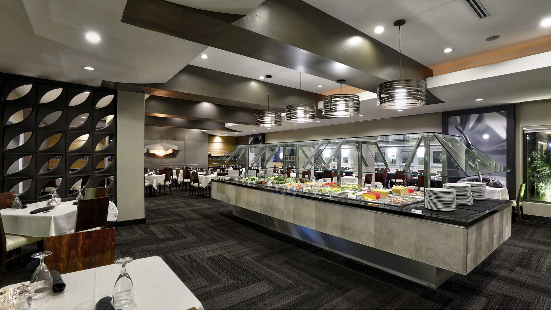Chima Brazilian steakhouse elegant courtyard dining with gauchos serving churrasco and gourmet salad bar