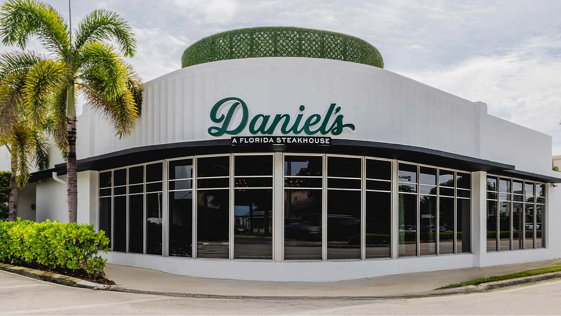 Daniel's A Florida Steakhouse farm-to-table dining with locally sourced steaks and Florida Highwaymen artwork
