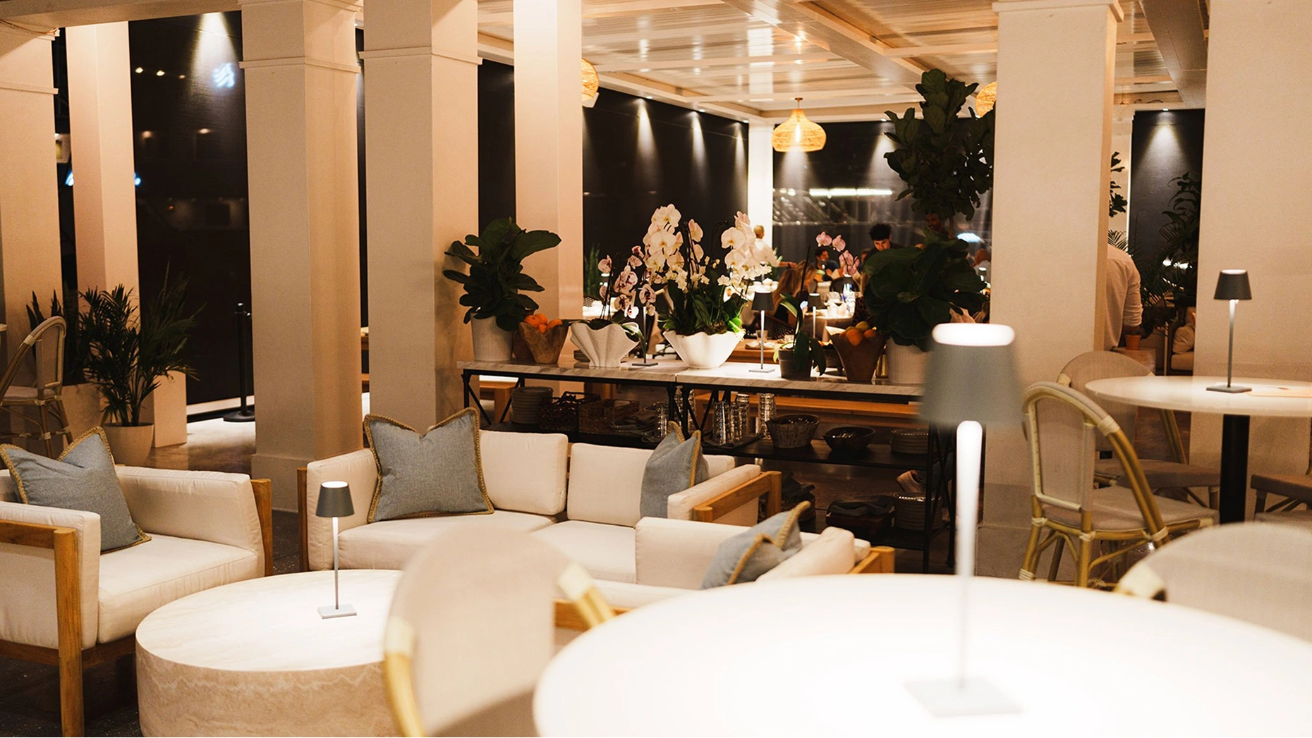 Waterfront view of Lamarina Restaurant at Safe Harbor Rybovich with Mediterranean-inspired decor.