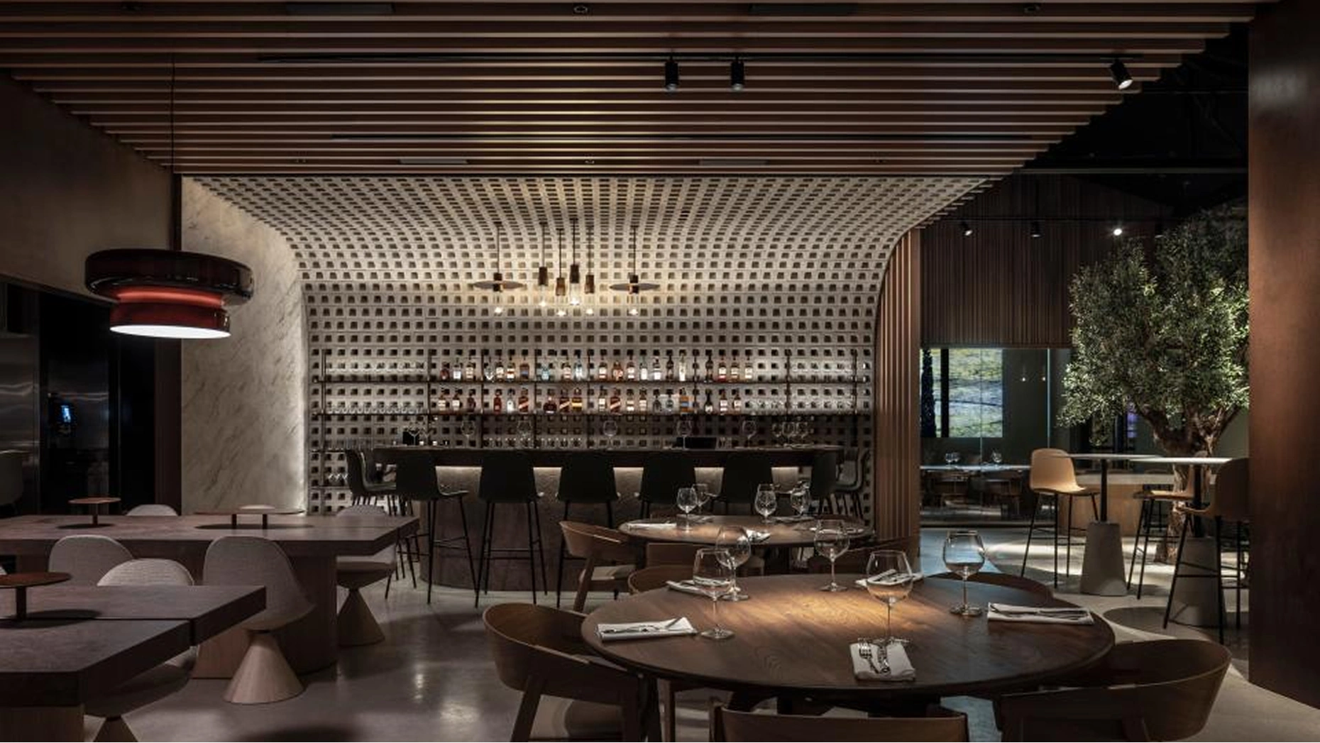 Modern interior of MALKA kosher restaurant in West Palm Beach, showcasing a stylish and welcoming dining room.