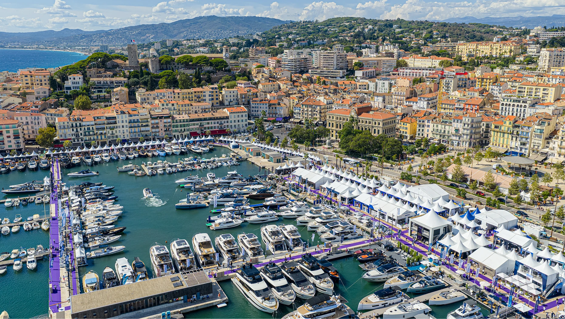 Vieux Port Cannes motor yacht display with Lérins islands views and luxury yachts from 12 to 45 meters