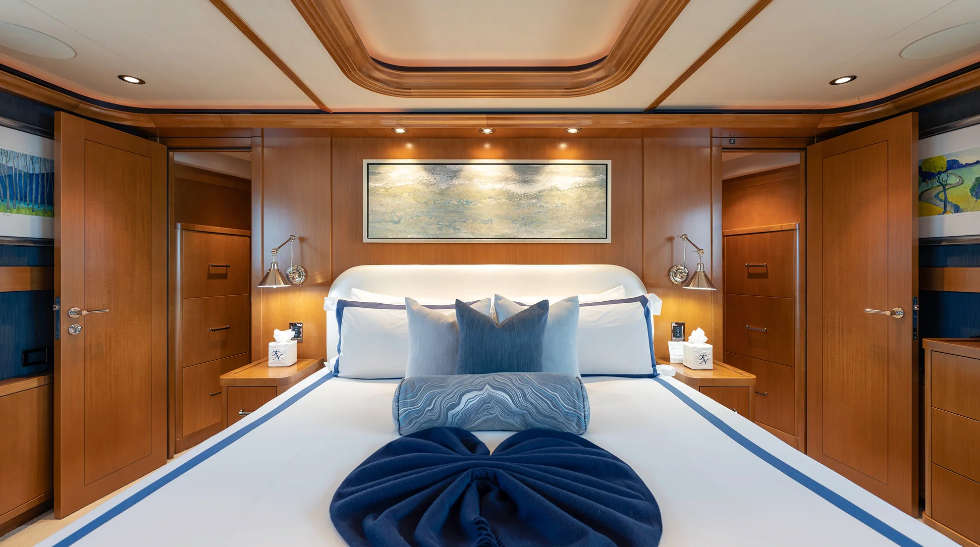 Full-beam master suite aboard FAR NIENTE — 2014 Westport 40M Tri Deck sold by Italian Yacht Group