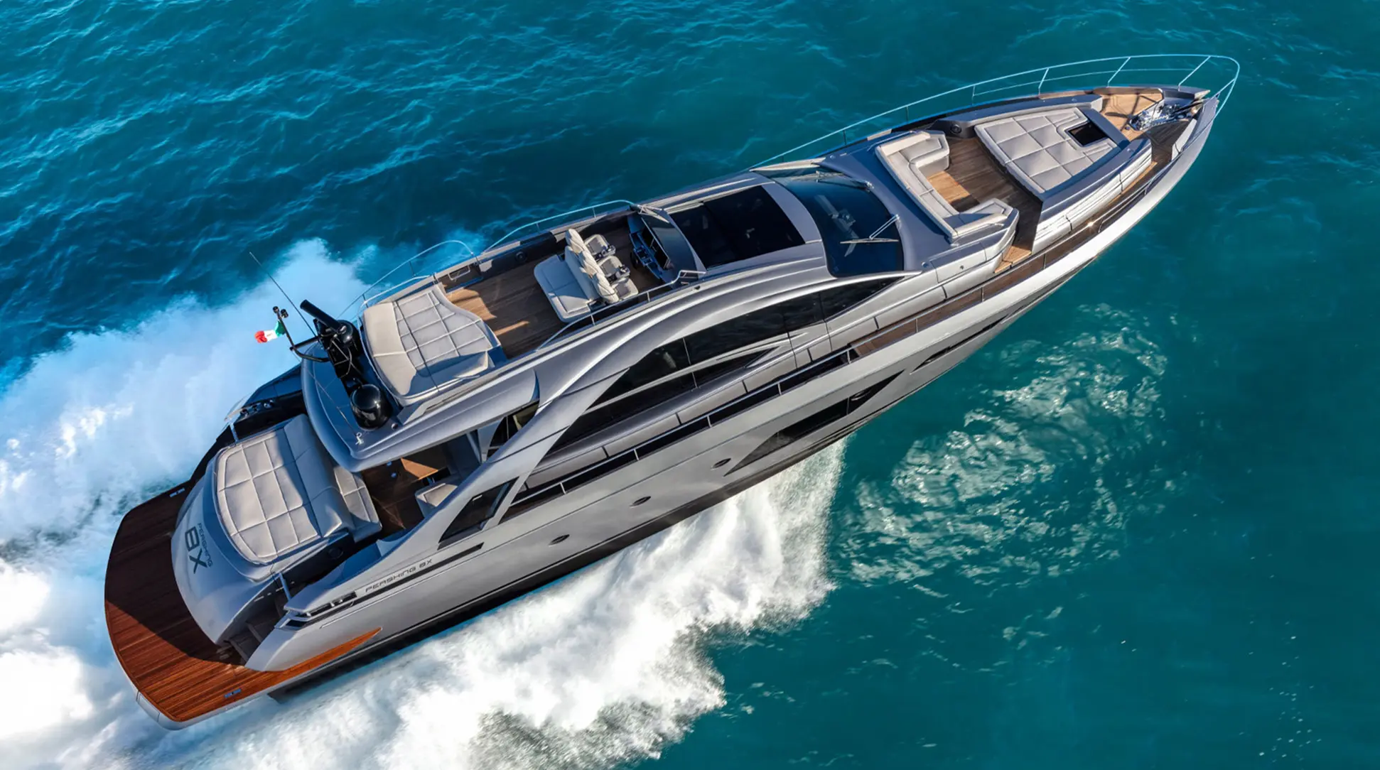 New Pershing 8X on open water, showcasing its carbon fiber hull and performance-first silhouette