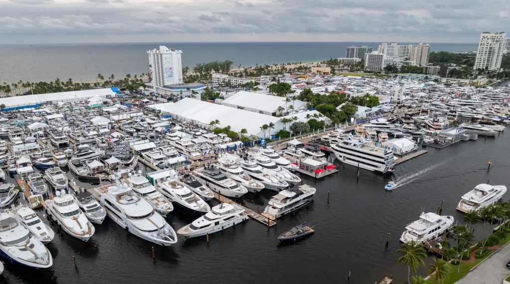 Aerial view of a yacht boat show with superyachts at the docks, showing the range brokers must know